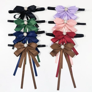 Set of 8 vintage satin bow brooches with rhinestone pearls in various elegant colors