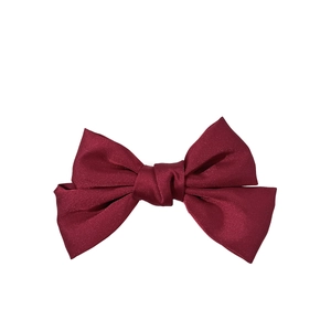 Elegant wine red satin bow hair clip with silk texture and shimmering finish for women