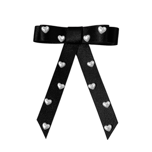 Elegant black satin bow hair clip with silver heart pearls and long trailing ribbons