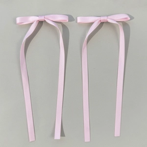 Fermagli per capelli con fiocchi di raso rosa e lunghi nastri eleganti per donne