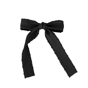 Elegant black mesh bow hair clip with scalloped edges and ballet core aesthetic