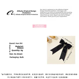 Detailed size chart of the black ribbon bow hair clip showing 11cm by 15.5cm dimensions