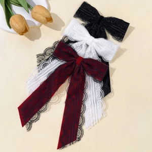 Set di fermagli per capelli con fiocco in pizzo vintage in nero, bianco e bordeaux