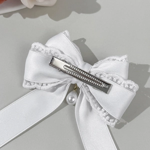 Elegant white lace ribbon bow hair clip with pearl pendant for a sweet lolita aesthetic