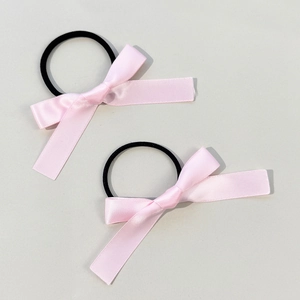 Pink satin bow hair ties set with black elastic bands for elegant ponytail styling