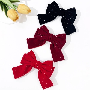 Three-piece velvet bow hair clips with rhinestones in black, burgundy and red