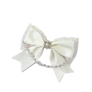 Elegant cream satin bow hair clip with lace trim and dangling pearl chain accessory