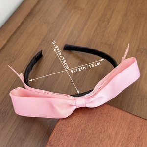 Elegant pink satin bow headband for women with detailed size measurements 15x13cm