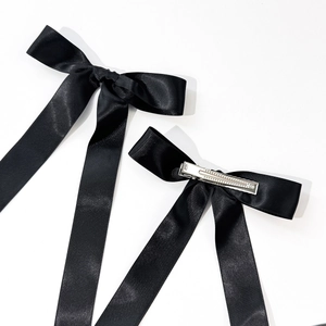 Elegant black satin bow hair clips with long tassels and silver metal crocodile clips