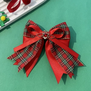 Weihnachtliche Haarklammer mit roter Karoschleife, Goldkrone und Herz-Edelstein-Detail