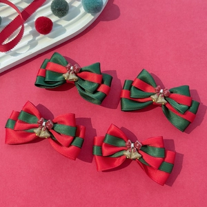 Lot de 4 barrettes nœuds de Noël avec rubans rouge et vert et petites cloches dorées