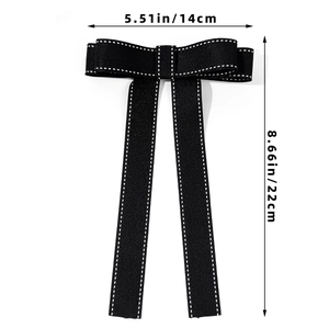 Elegant black bow accessory with white stitching details measuring 14cm by 22cm size