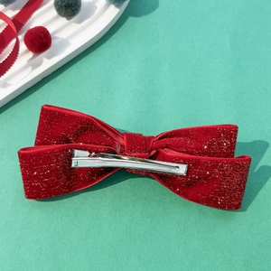 Sparkly red velvet bow hair clip with gold glitter and silver metal crocodile clip