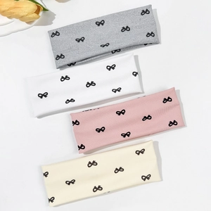 Detailed set of four elastic bow-knot hairbands in grey, white, pink, and beige colors