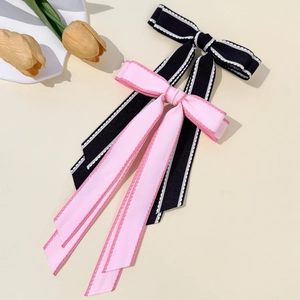 Barrettes à nœuds papillon double couche élégantes en noir et rose avec de longs rubans