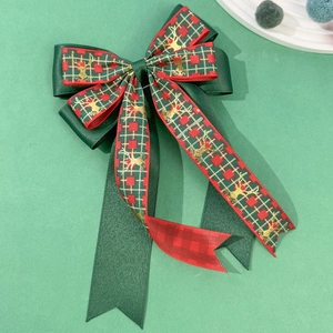 Barrette nœud de Noël avec motif cerf doré et ruban à carreaux vert et rouge