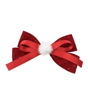 Red velvet and satin double-layered bow hair clip with plush white pom-pom and sequins