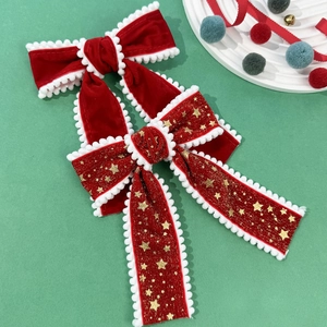 Weihnachts-Haarspangen aus rotem Samt und Goldstern-Band mit weißen Bommel-Verzierungen
