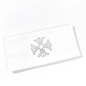 White ribbed knitted headband featuring a sparkly rhinestone gothic cross design