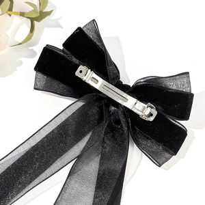 Elegant black velvet and organza bow hair clip with a vintage metallic spring clasp