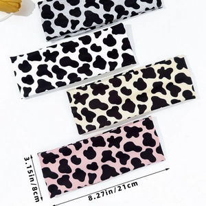 Set de cuatro diademas elásticas con estampado de vaca para fitness de 8x21cm