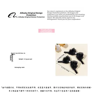 Détails des barrettes nœuds noirs avec perles montrant les dimensions de 14 cm