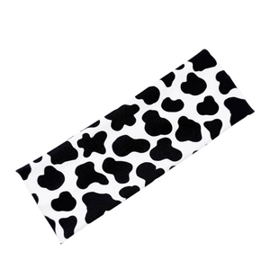 Diadema elástica ancha con estampado de vaca en tejido de punto para deporte y moda
