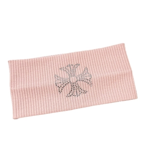 Pink knitted headband featuring a rhinestone cross pattern for yoga and fashion