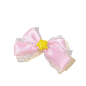 Pink satin bow hair clip with white lace trim and yellow star charm for girls