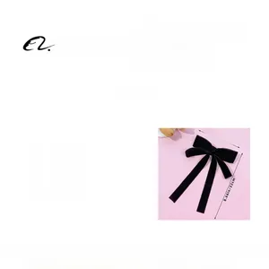 Detail showing dimensions of the vintage black velvet bow hair clip with elegant long ribbons