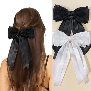Barrette nœud élégante en satin et dentelle avec longs rubans noir et blanc