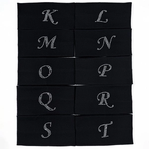 Black ribbed elastic headbands featuring rhinestone letters K through T for sport yoga