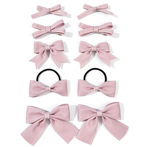Set di 10 fermagli e elastici per capelli con fiocco rosa e cuciture bianche