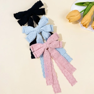 Elegant lace bow hair clips with long ribbons in black, blue, and pink colors