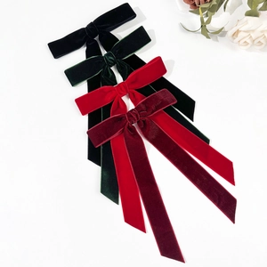 Set of four elegant velvet bow hair clips in black green red and burgundy colors