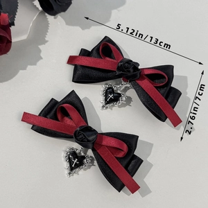 Gothic hair clips with black red satin bows, rose details, and silver heart cross charms