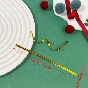 Detail view of 15cm metallic gold twist ties for Christmas gift packaging and sealing