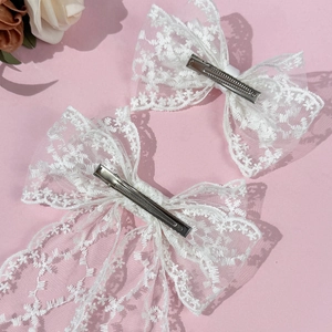 Elegant white lace bow hair clip set with long tulle ribbon and silver metal grip