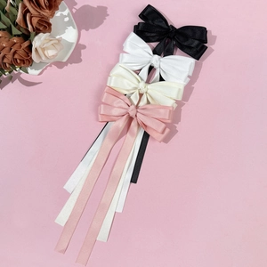 Elegant satin bow hair clips with long streamers in black, white, cream and pink set