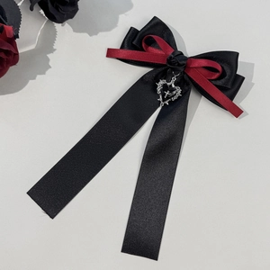 Gothic hair bow detail with black rose, layered ribbon and silver cross heart pendant