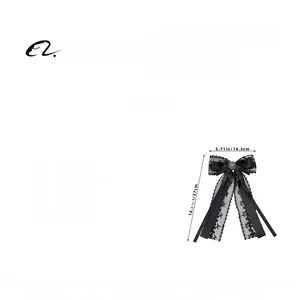 Detailed size specifications of a black lace bow hair clip with crystal pearl center