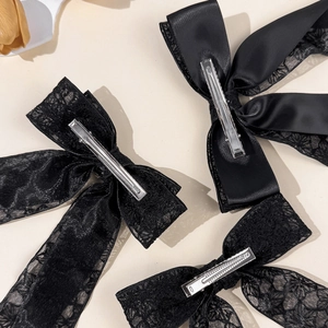 Elegant black embroidered lace and satin bow hair clips with silver alligator clips on the back