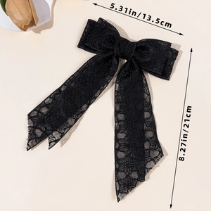 Detail showing dimensions of the black floral lace bow hairpin with 21cm length