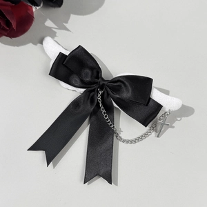 Gothic black satin bow hair clip featuring plush angel wings and silver chain with cross