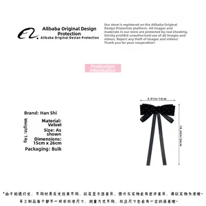 Detailed view of black velvet bow hair clip with ribbons, showing dimensions 15cm by 26cm