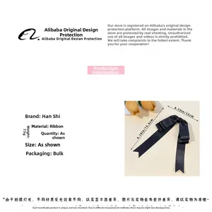 Detail of navy blue ribbon bow hair clip showing 15.5cm size and 7.5g weight