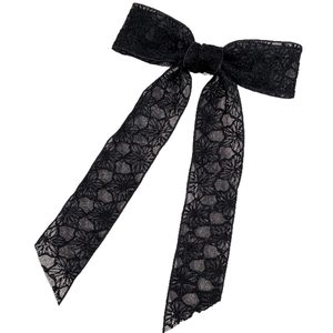 Elegant black lace bow hair clip with floral embroidery and long flowing ribbons