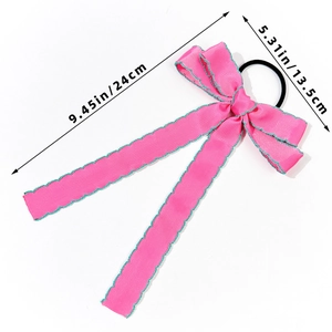 Pink ribbon bow hair tie with dimensions 9.45in length and 5.31in width for girls