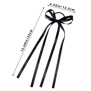 Dettaglio di un elastico in raso nero con nastri, larghezza 12,5 cm e lunghezza 32 cm