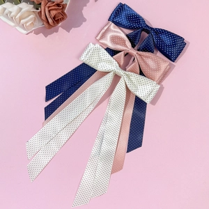 Mollette per capelli a pois in raso con nastri lunghi in blu navy, rosa e bianco